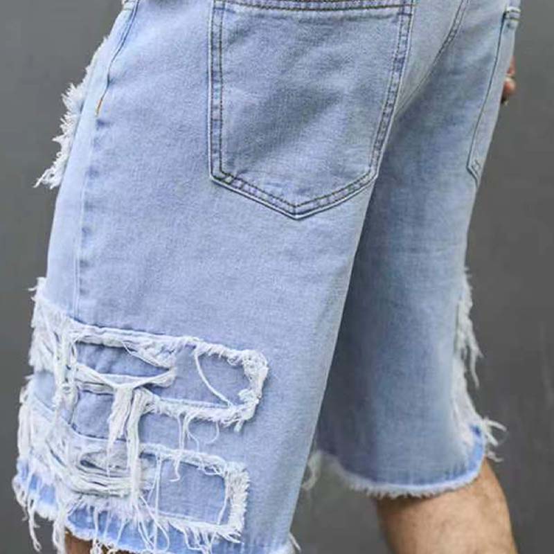 Pantalones cortos vaqueros rotos