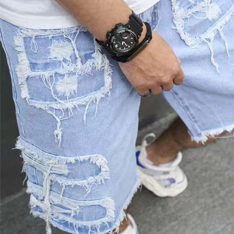 Pantalones cortos vaqueros rotos