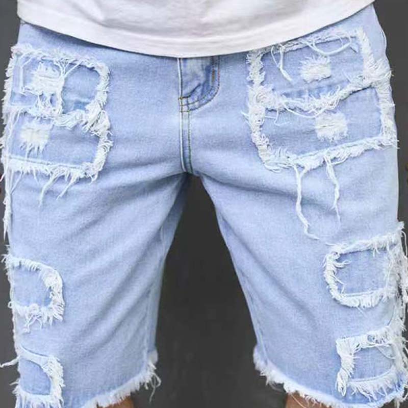 Pantalones cortos vaqueros rotos