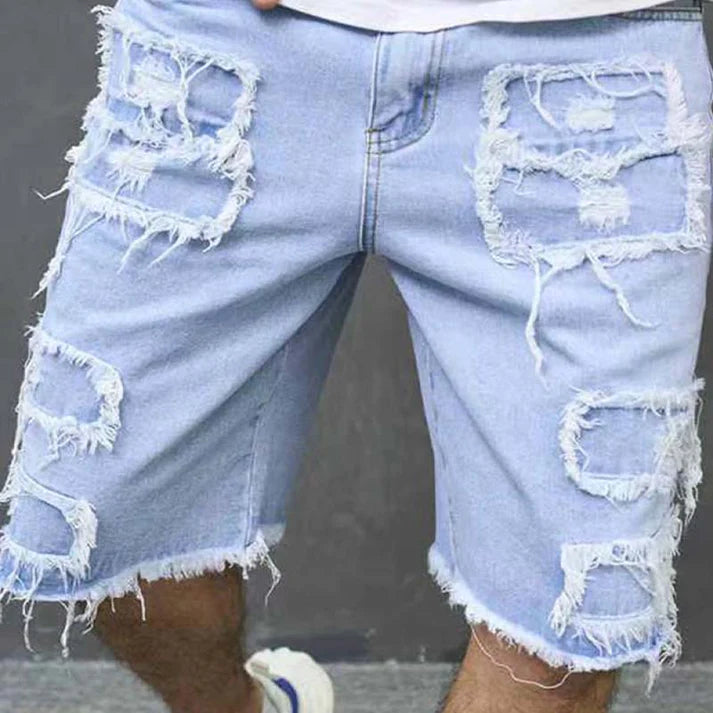 Pantalones cortos vaqueros rotos